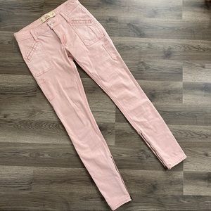 Pink jeans with zippers
